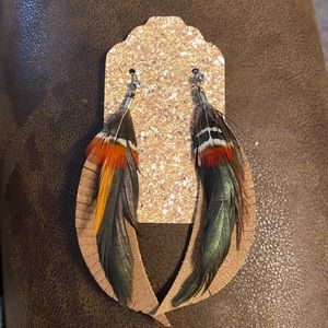 Buckle, feather, dangle, earrings. Like new. Really pretty on. $16